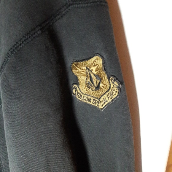 A black/gold colored Volcom Special Forces jacket - Picture 4 of 7